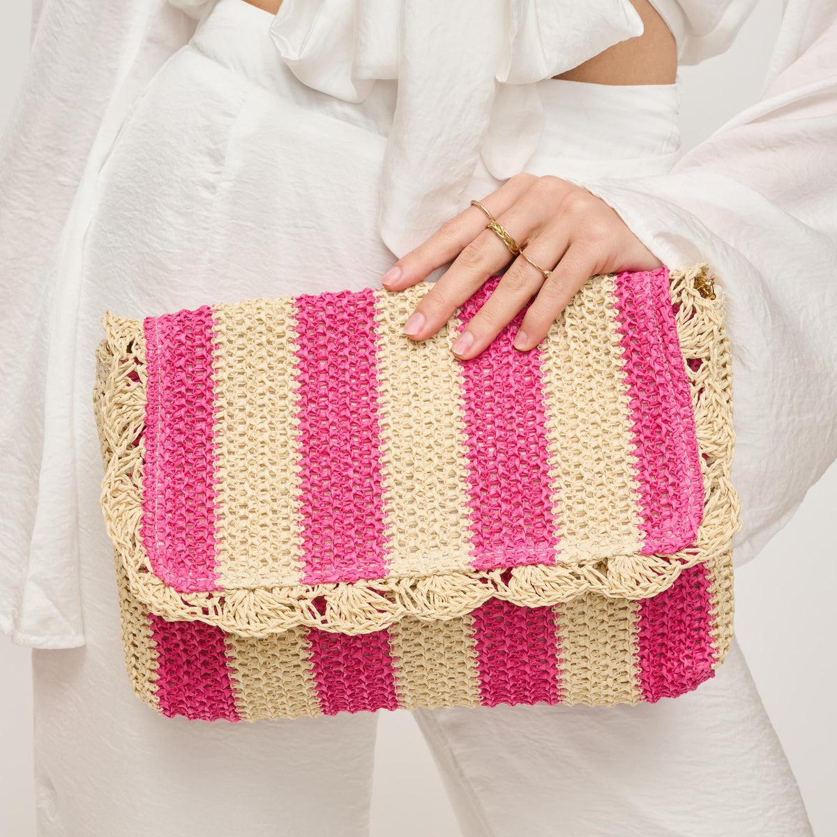 Woman wearing Pink Natural Urban Expressions Winnie Clutch 840611153999 View 1 | Pink Natural