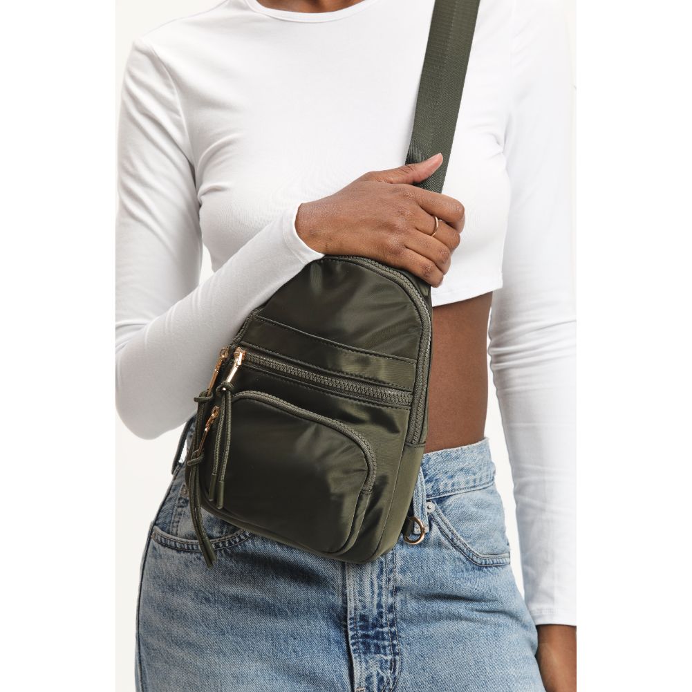 Woman wearing Olive Urban Expressions Sid Sling Backpack 840611120687 View 4 | Olive