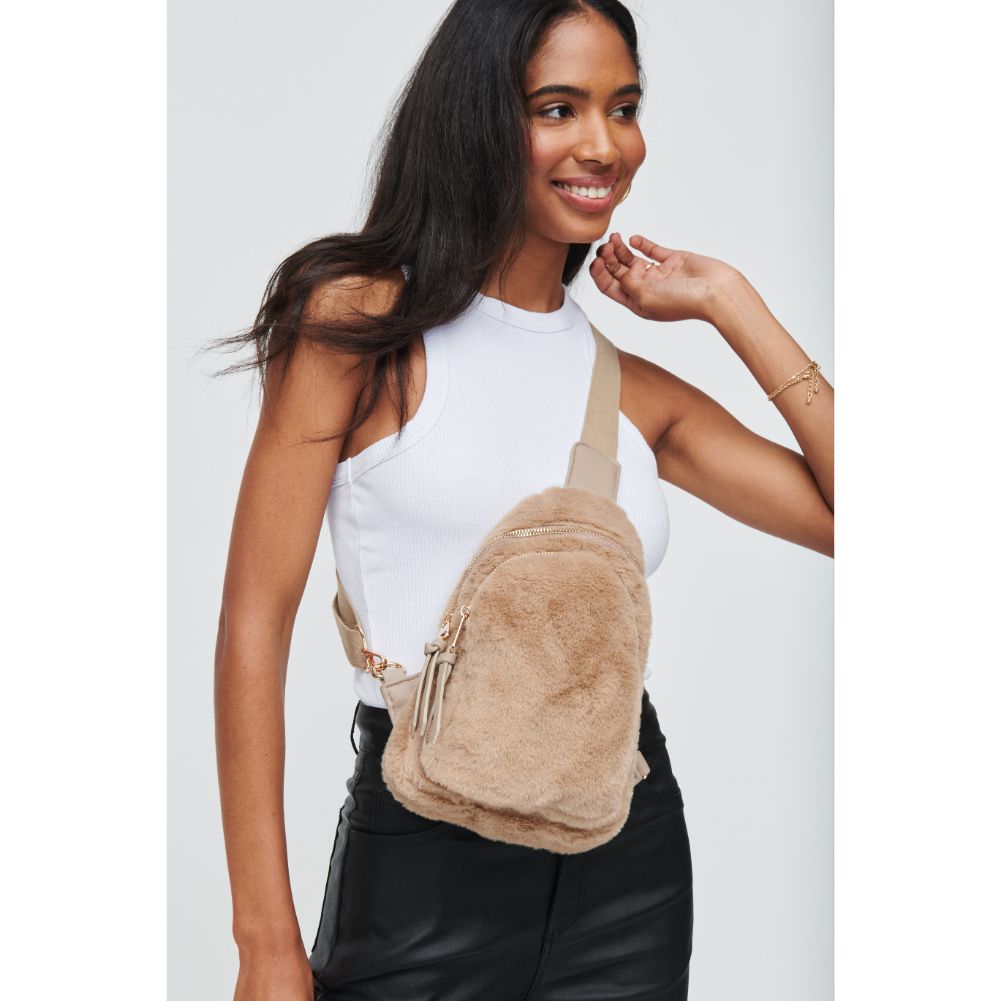 Woman wearing Taupe Urban Expressions Ace Faux Fur Sling Backpack 840611104588 View 1 | Taupe