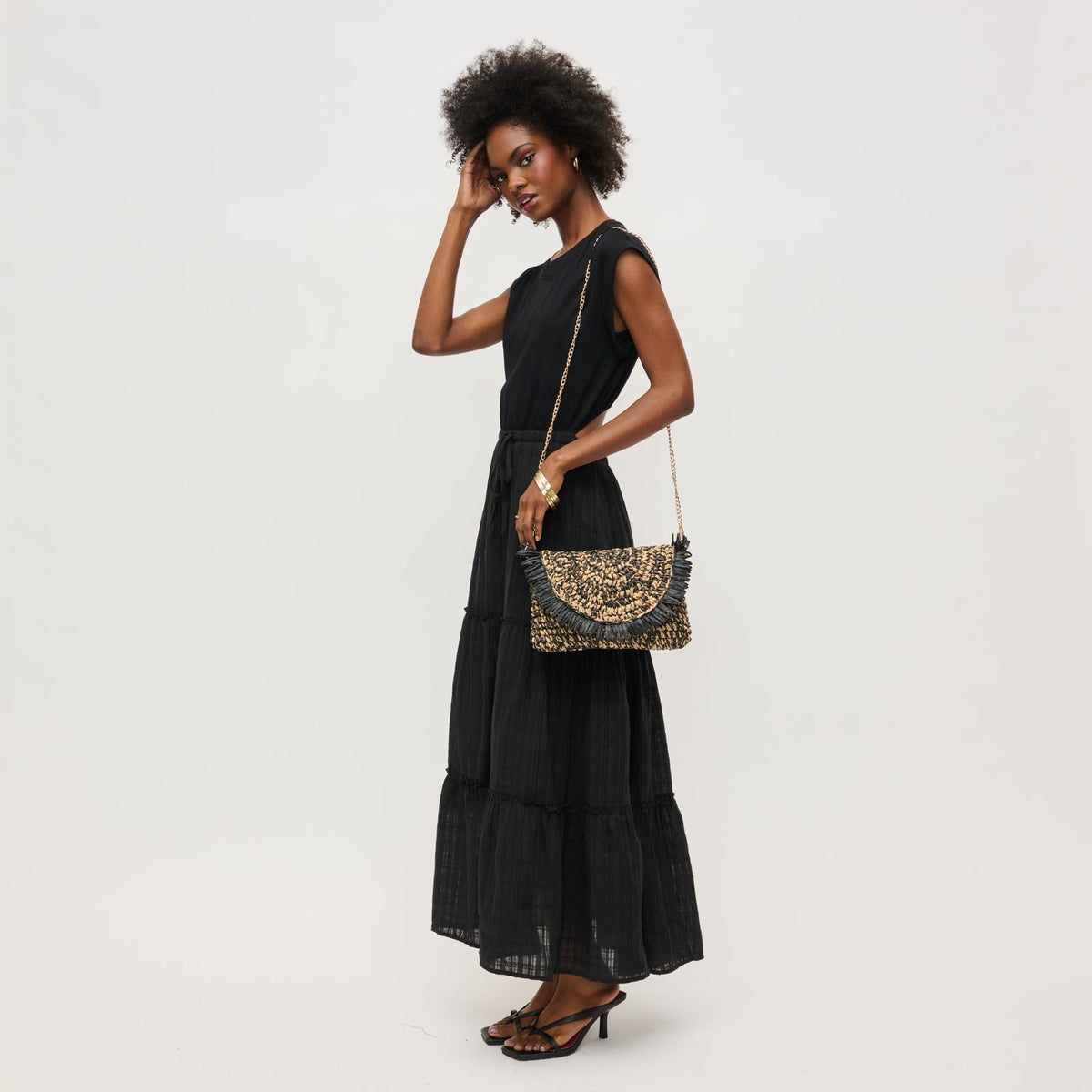 Woman wearing Black Natural Urban Expressions Katia Clutch 840611158550 View 2 | Black Natural