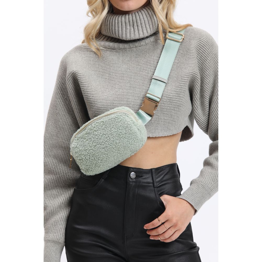 Woman wearing Sage Urban Expressions Santi Belt Bag 840611190468 View 1 | Sage