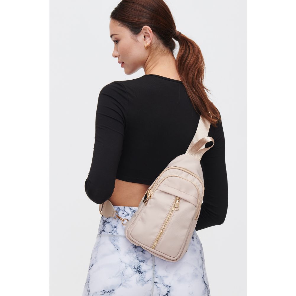 Woman wearing Natural Urban Expressions Wagner Sling Backpack 840611108371 View 2 | Natural