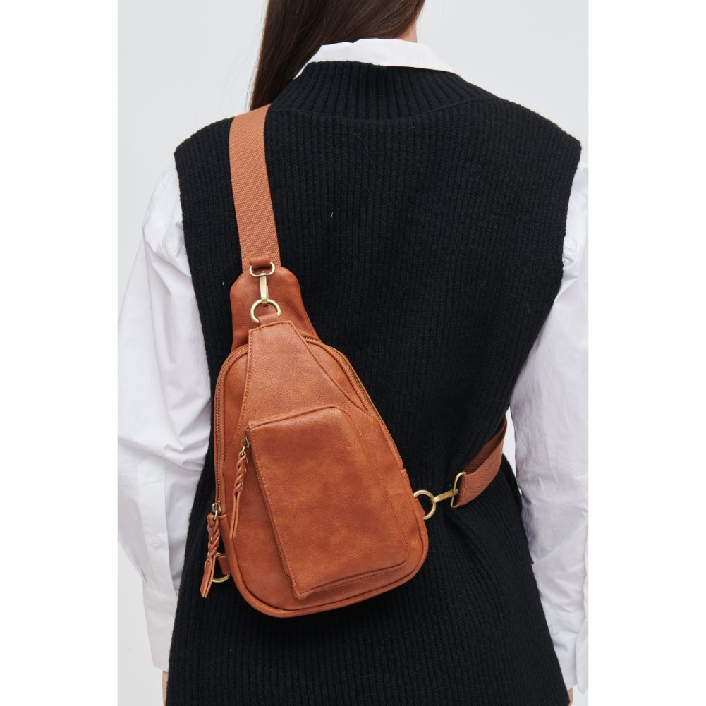 Woman wearing Tan Urban Expressions Wendall Sling Backpack 840611107220 View 2 | Tan