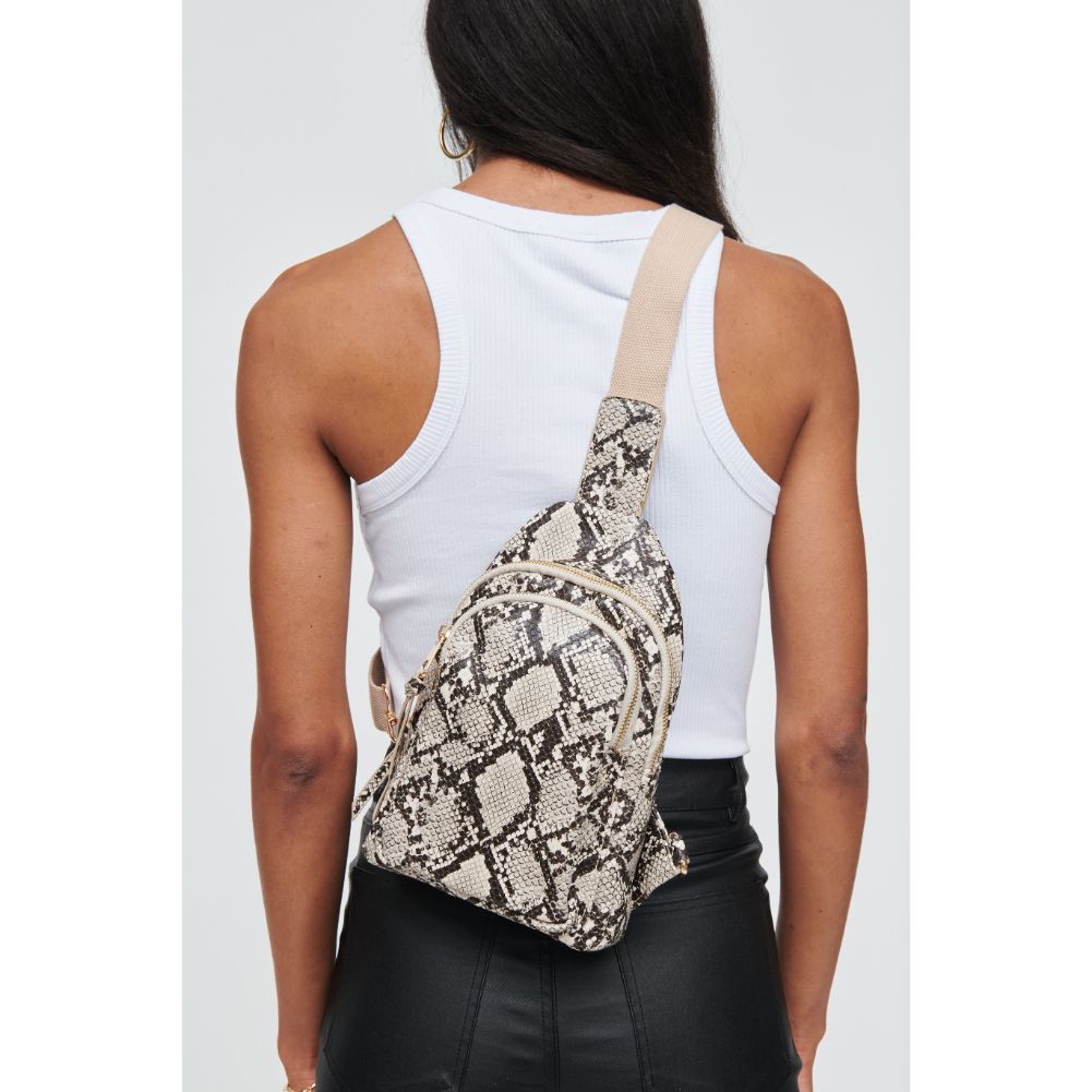 Woman wearing Natural Urban Expressions Ace - Snake Sling Backpack 840611104557 View 2 | Natural