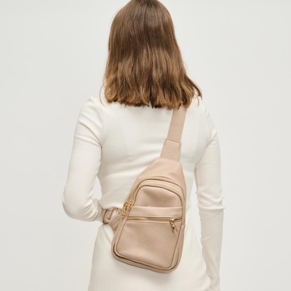 Woman wearing Natural Urban Expressions Zephyr Sling Backpack 840611193308 View 2 | Natural