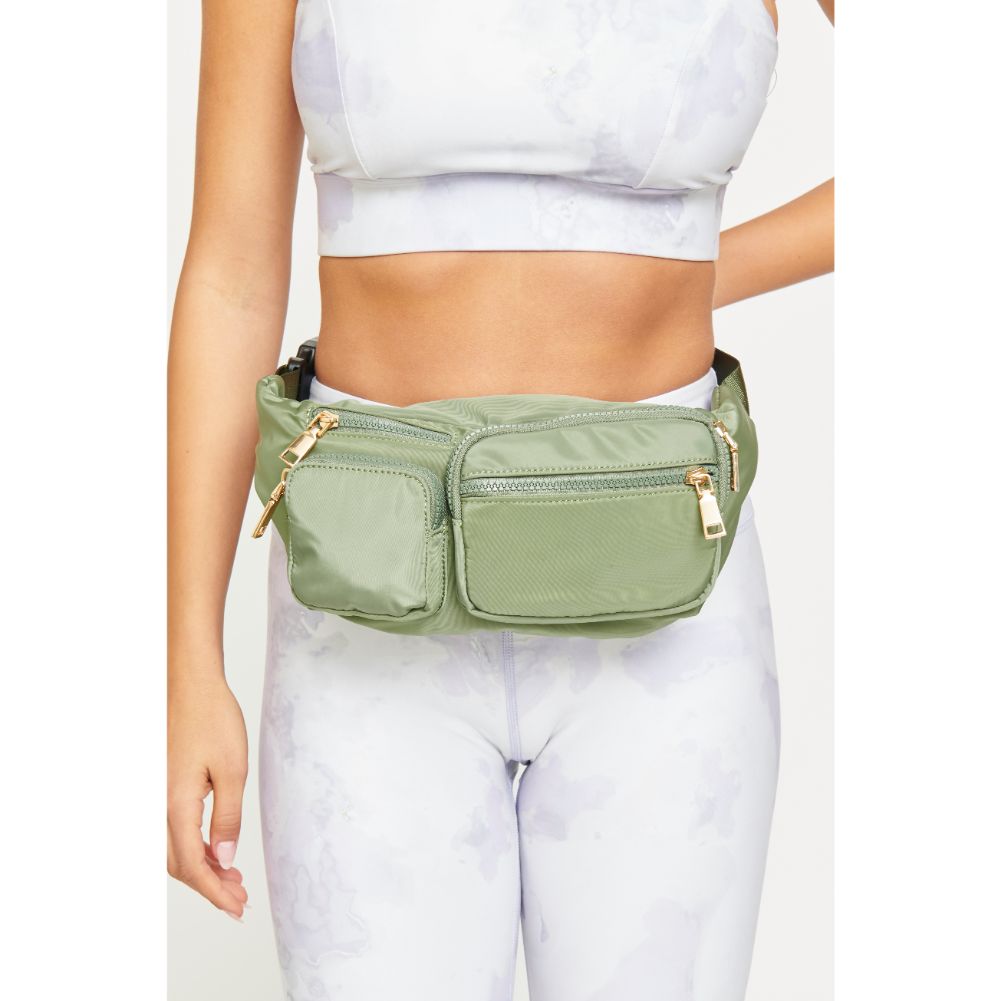 Woman wearing Olive Urban Expressions Lottie Belt Bag 840611177742 View 2 | Olive