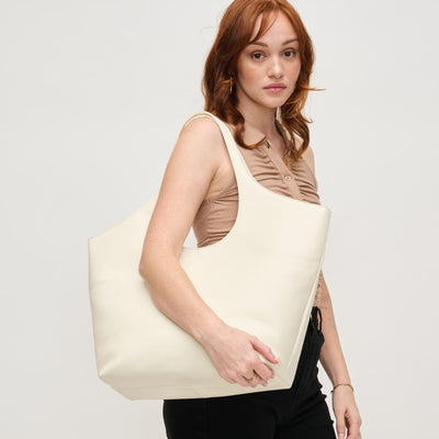 Woman wearing Ivory Urban Expressions Luna Tote 840611161505 View 1 | Ivory