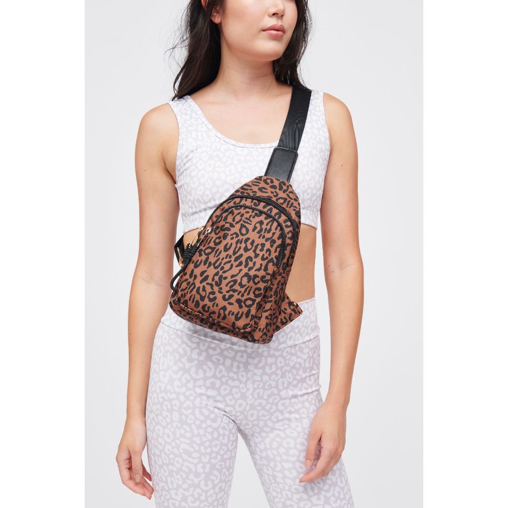 Woman wearing Leopard Urban Expressions Ace Sling Backpack 840611184191 View 1 | Leopard