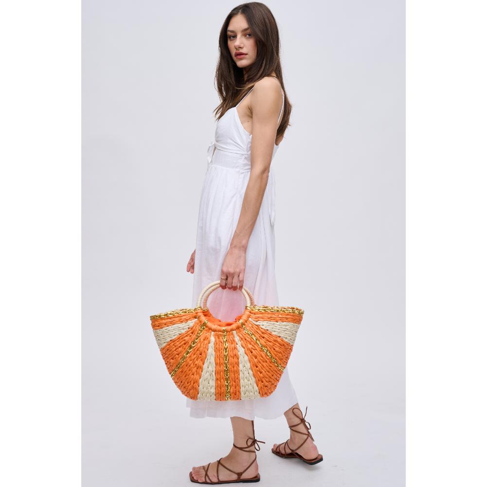 Woman wearing Orange Multi Urban Expressions Carmen Tote 840611123121 View 4 | Orange Multi