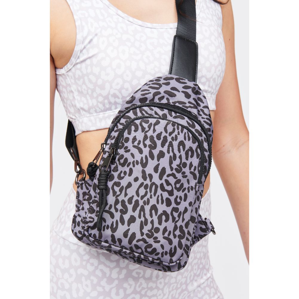 Woman wearing Grey Leopard Urban Expressions Ace Sling Backpack 840611184214 View 2 | Grey Leopard