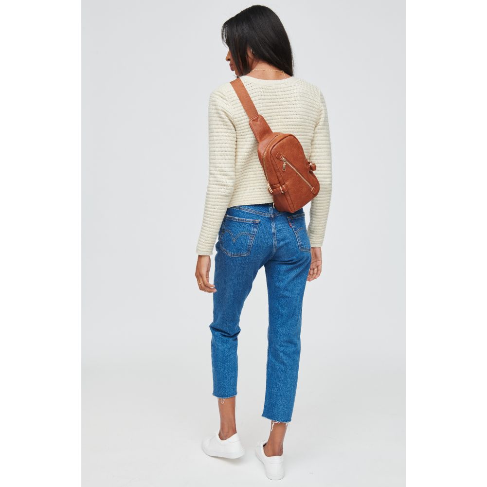 Woman wearing Tan Urban Expressions Micah Sling Backpack 840611108814 View 4 | Tan