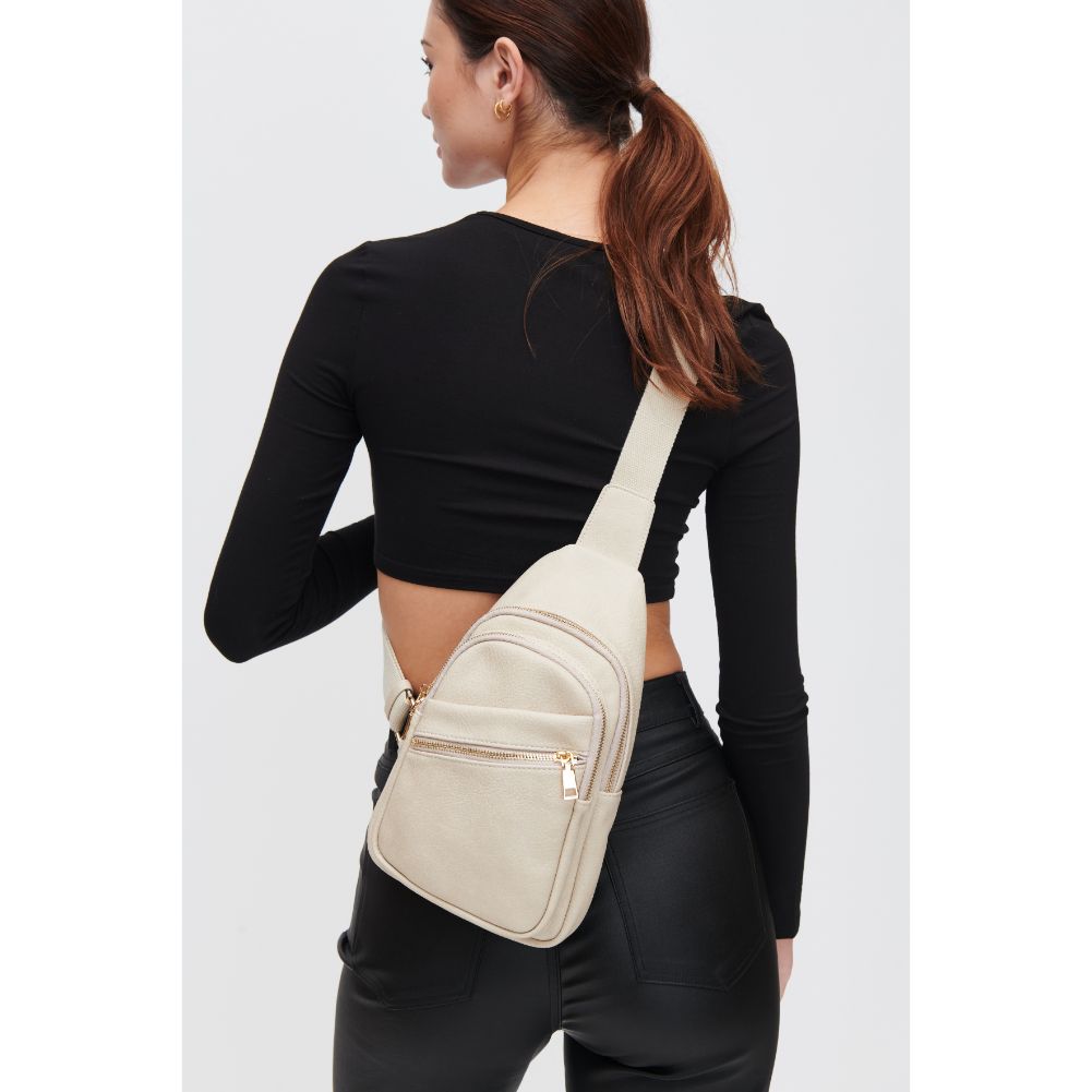 Woman wearing Almond Urban Expressions Zephyr Sling Backpack 840611106902 View 2 | Almond