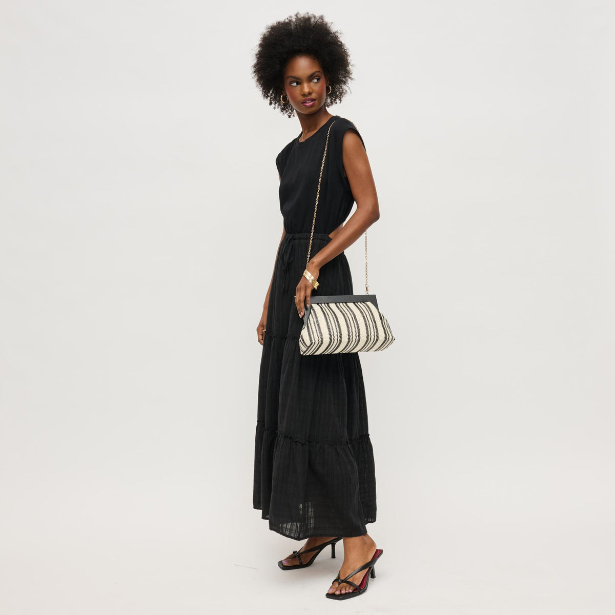 Woman wearing Black White Urban Expressions Margot Clutch 840611143655 View 4 | Black White