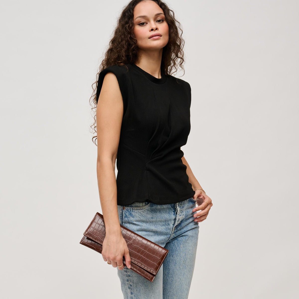 Woman wearing Chocolate Urban Expressions Adelle Clutch 840611139665 View 3 | Chocolate