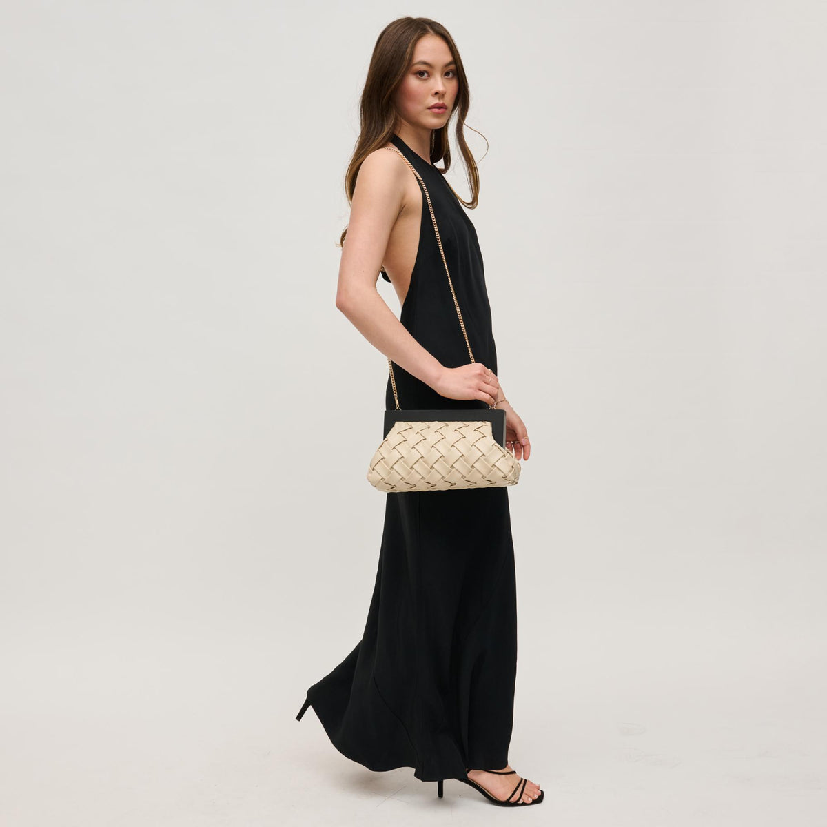 Woman wearing Ivory Urban Expressions Jamie Clutch 840611156921 View 4 | Ivory