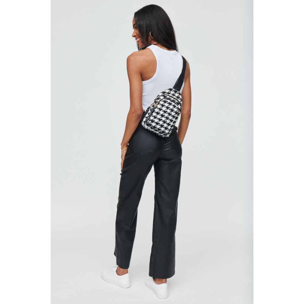 Woman wearing Houndstooth Urban Expressions Ace - Houndstooth Sling Backpack 840611104564 View 3 | Houndstooth