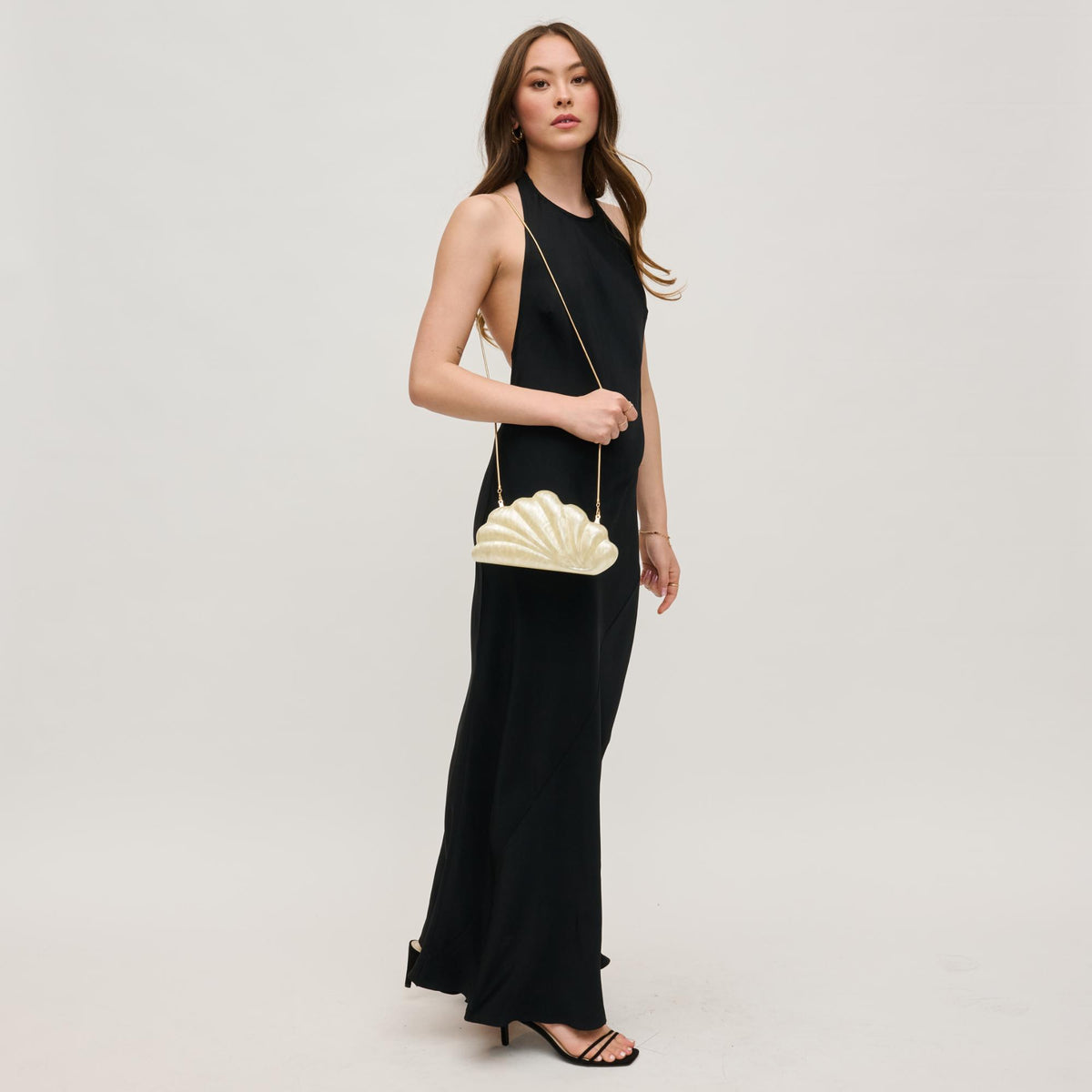 Woman wearing Ivory Urban Expressions Andrina Evening Bag 840611156396 View 4 | Ivory