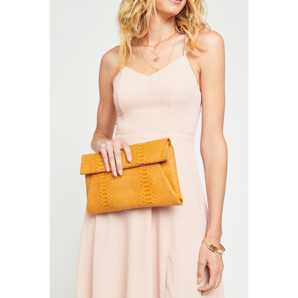 Woman wearing Caramel Urban Expressions Emilia Clutch 840611171306 View 2 | Caramel