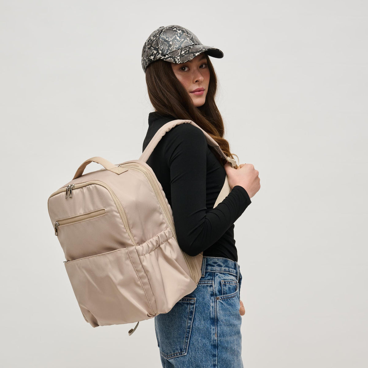 Woman wearing Nude Urban Expressions Urban Explorer Backpack 840611195364 View 2 | Nude