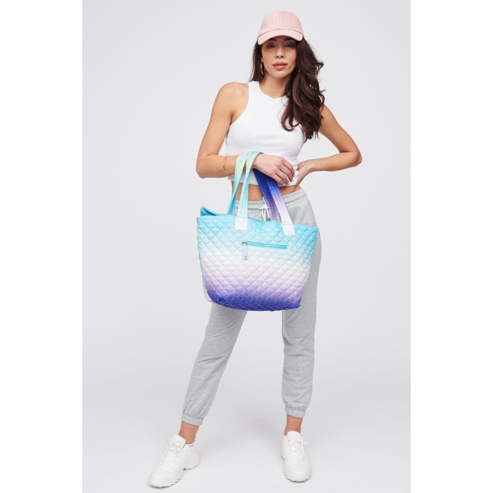 Woman wearing Sky Multi Urban Expressions Breakaway Tote 818209018487 View 3 | Sky Multi