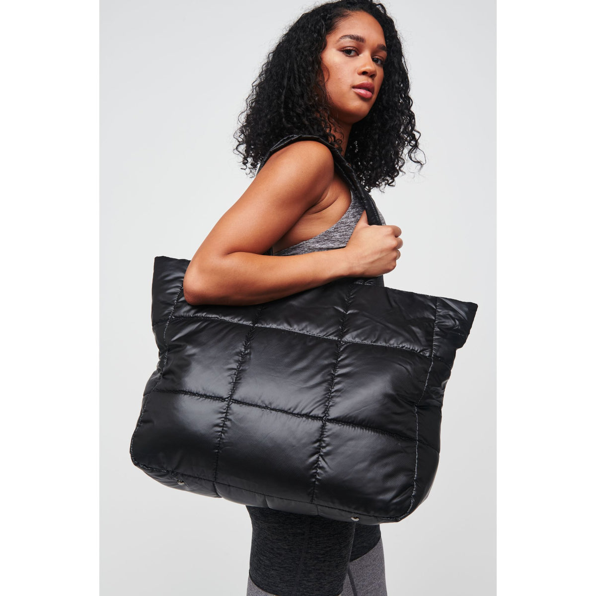 Woman wearing Black Urban Expressions Neeva Tote 818209010399 View 2 | Black