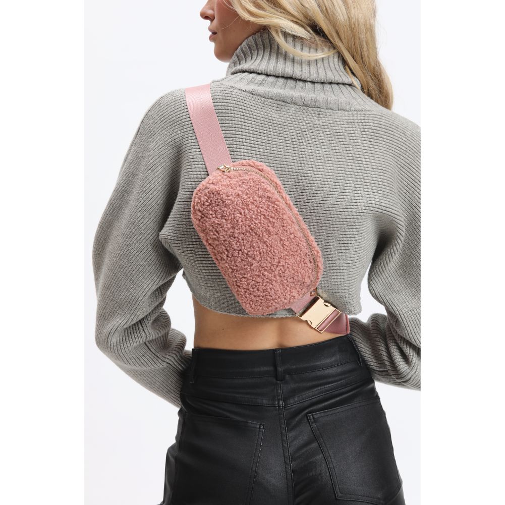 Woman wearing Rose Urban Expressions Santi Belt Bag 840611190475 View 3 | Rose