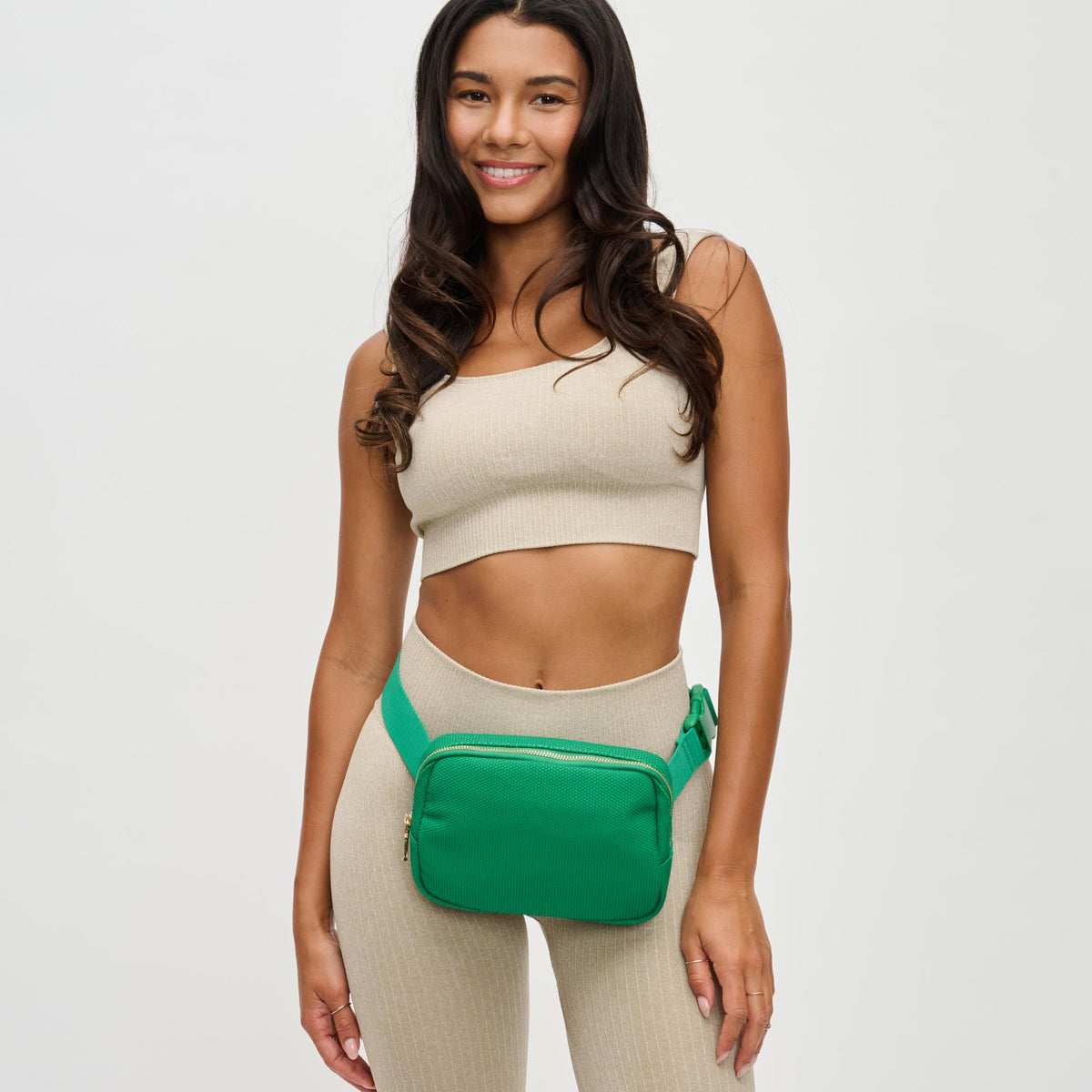 Woman wearing Green Urban Expressions Felix Belt Bag 840611122711 View 1 | Green