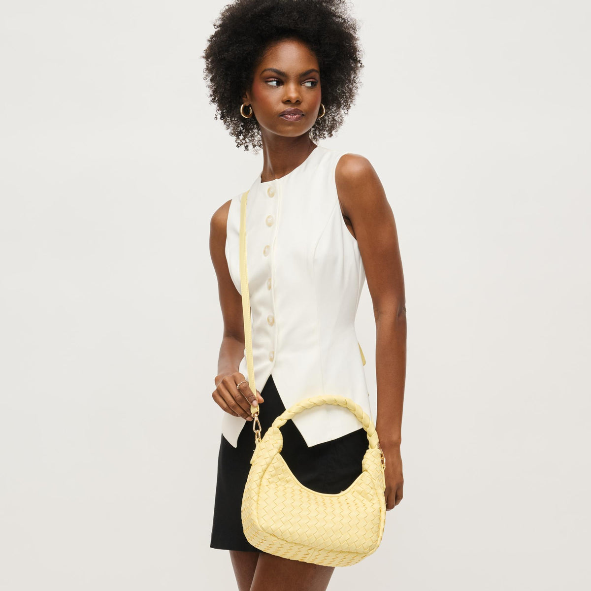 Woman wearing Butter Urban Expressions Laken Crossbody 840611144584 View 3 | Butter