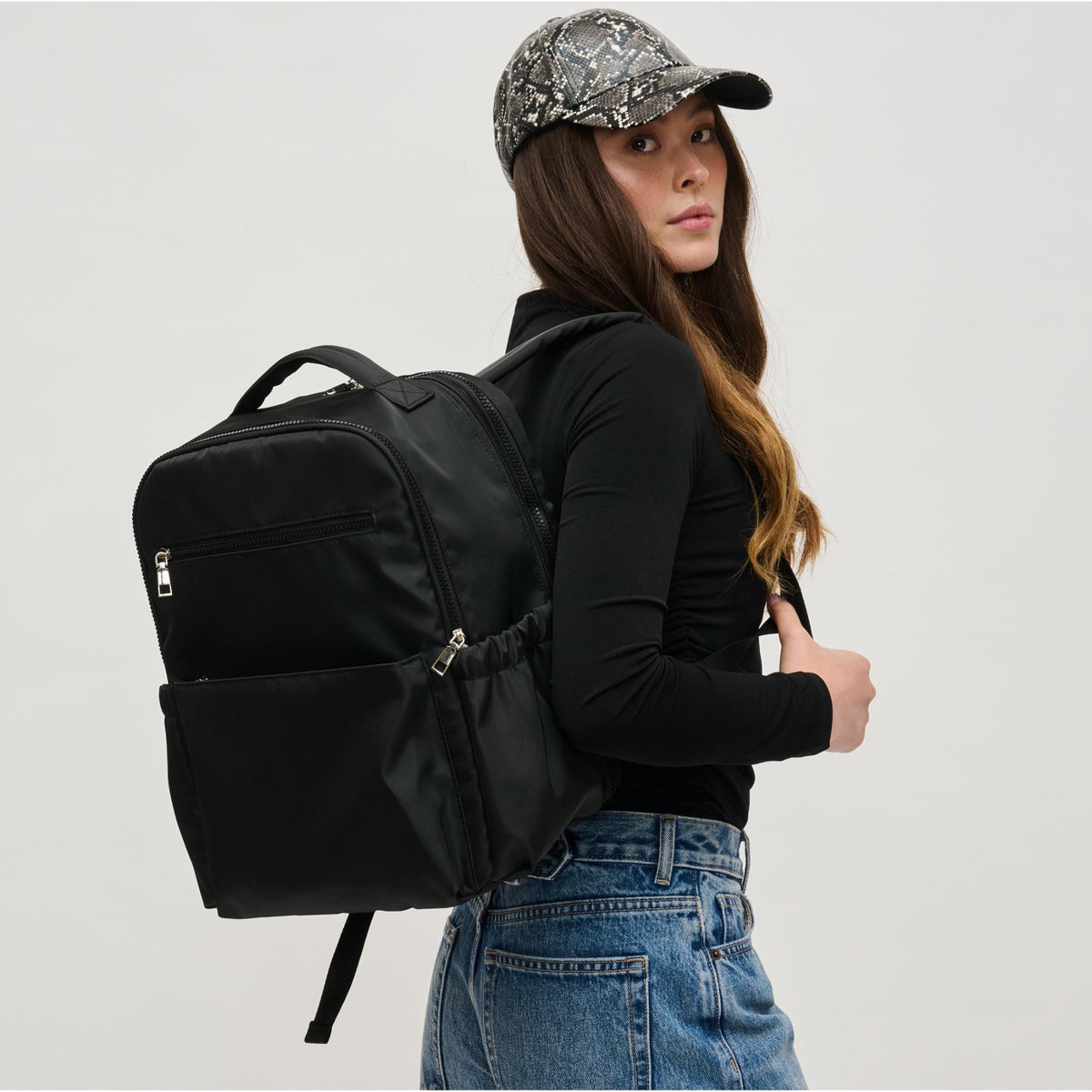 Woman wearing Black Urban Expressions Urban Explorer Backpack 840611195357 View 2 | Black