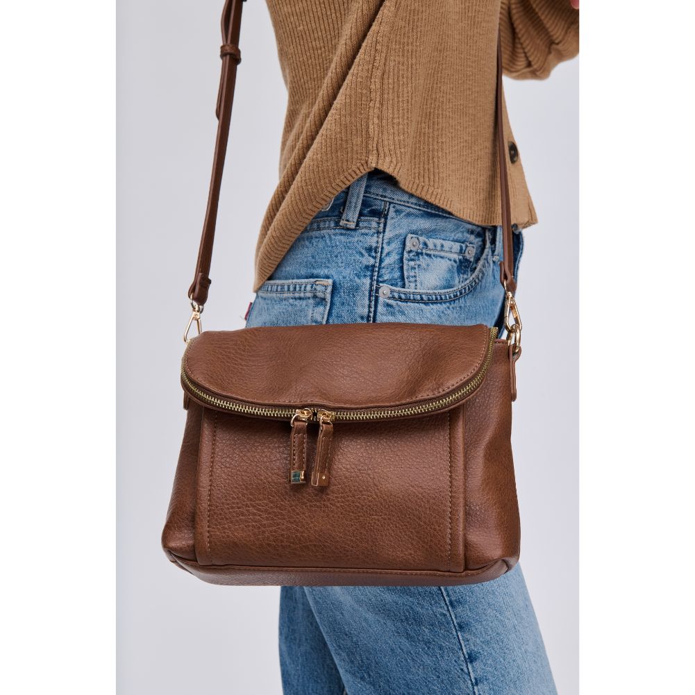 Woman wearing Chocolate Urban Expressions Iris Crossbody 840611116031 View 4 | Chocolate