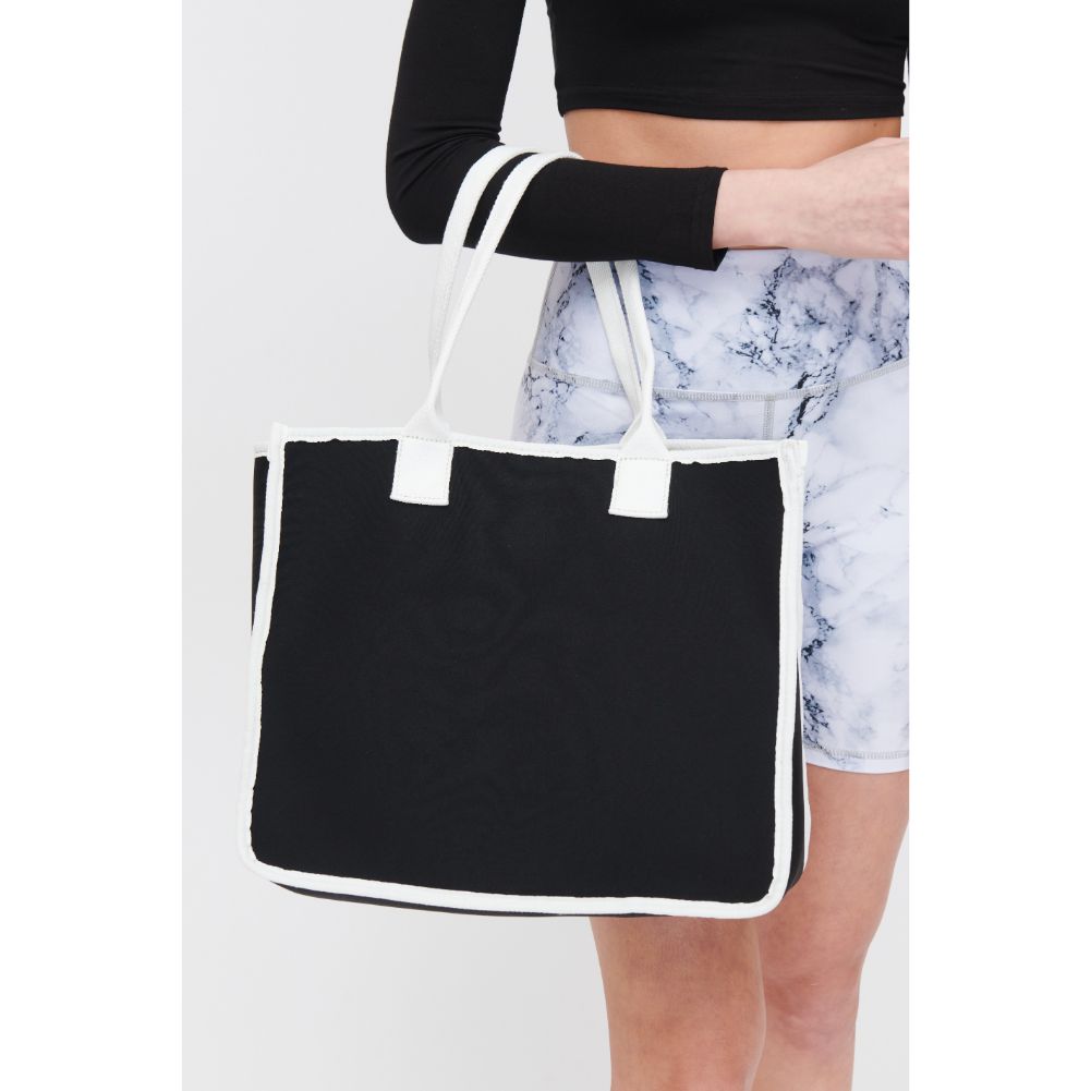 Woman wearing Black White Urban Expressions Wade Tote 840611118141 View 4 | Black White