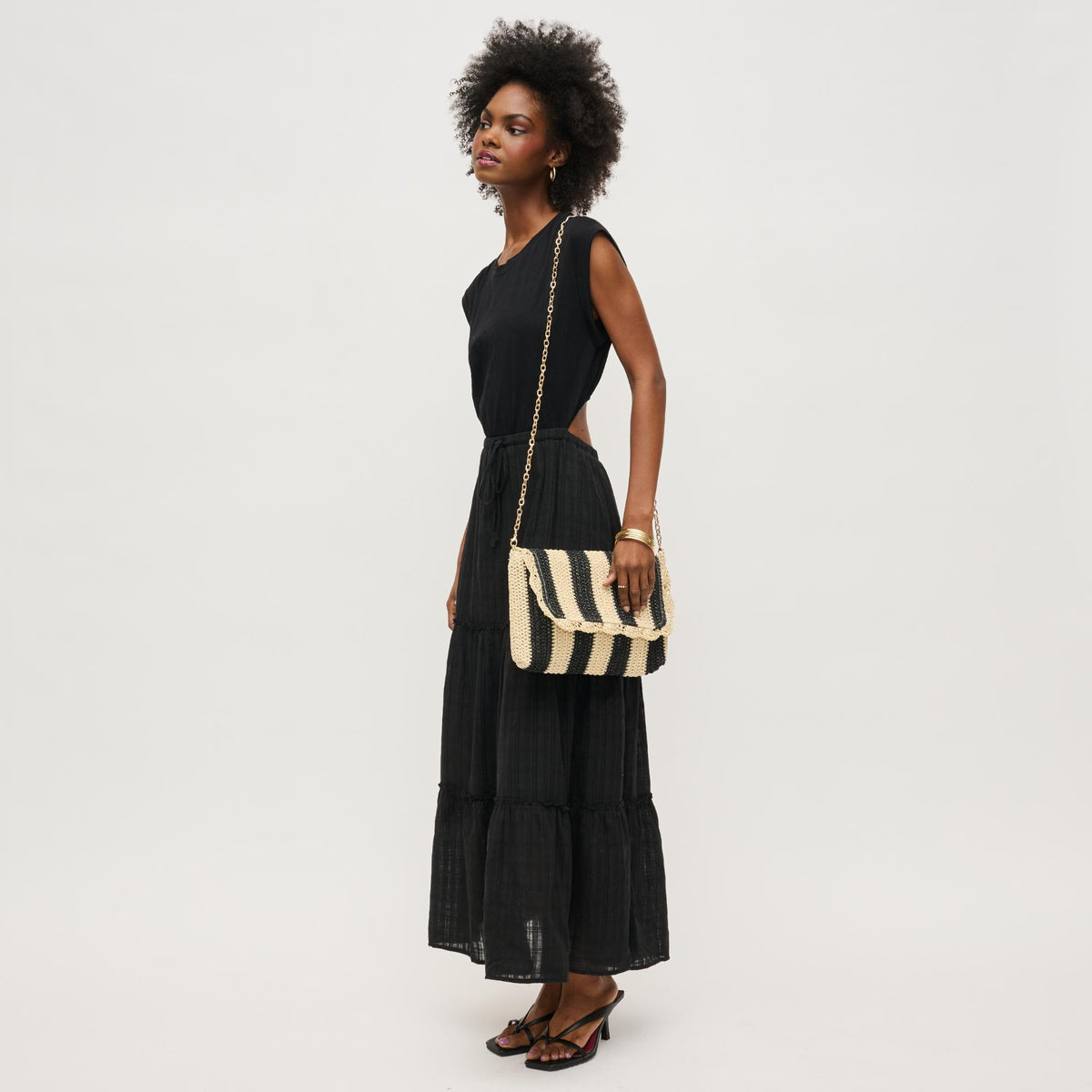 Woman wearing Black Natural Urban Expressions Winnie Clutch 840611153975 View 3 | Black Natural