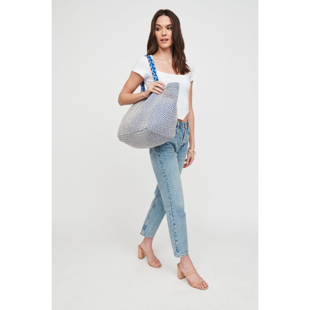 Woman wearing Blue White Urban Expressions Marbella Tote 818209015738 View 3 | Blue White