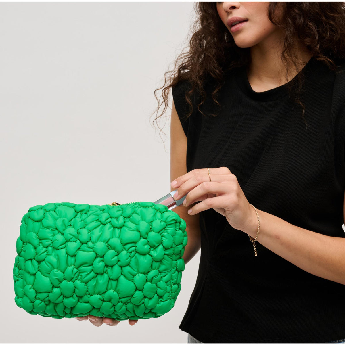 Woman wearing Kelly Green Urban Expressions Flora Pop - Nylon Cosmetic Pouch 840611144201 View 2 | Kelly Green