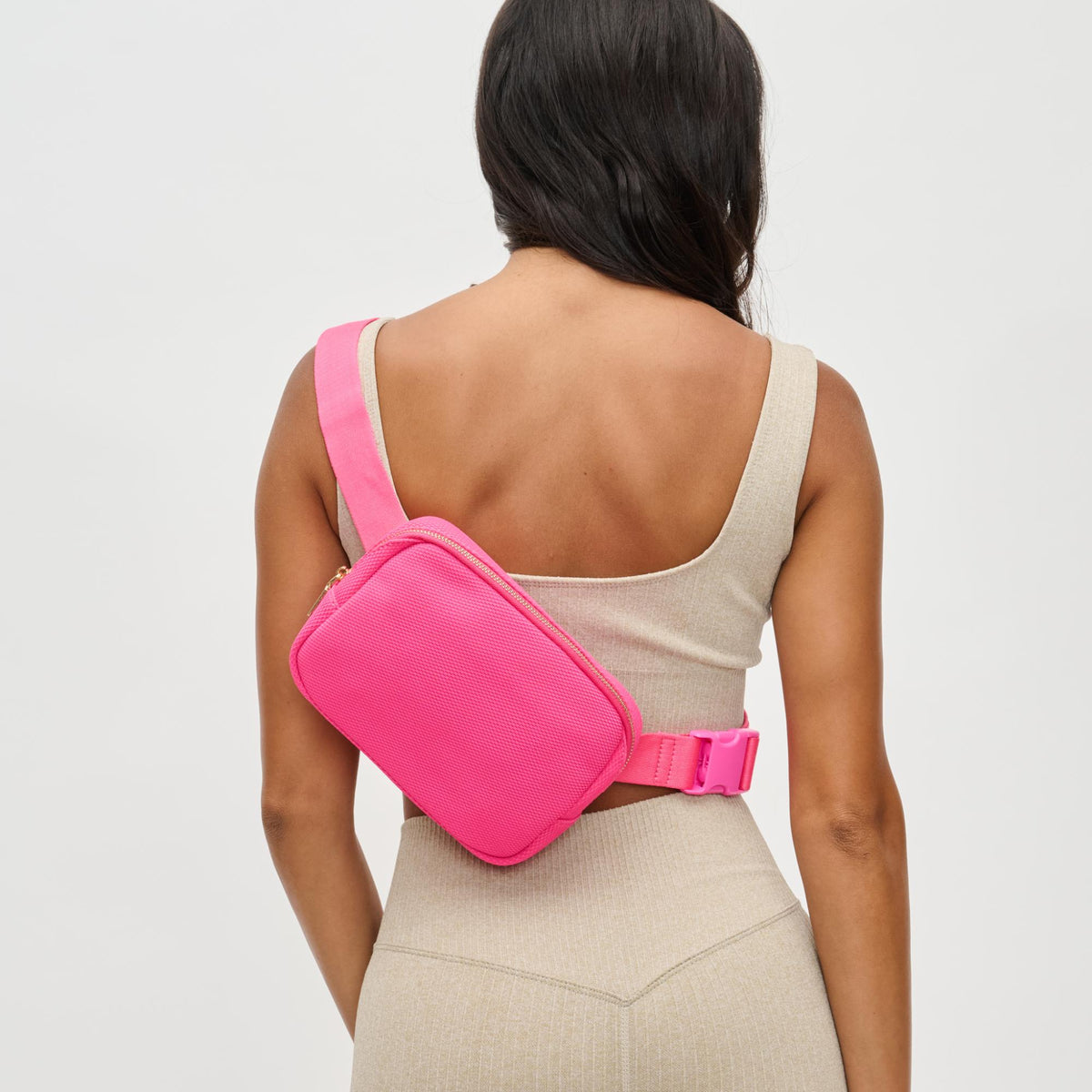 Woman wearing Hot Pink Urban Expressions Felix Belt Bag 840611122698 View 2 | Hot Pink