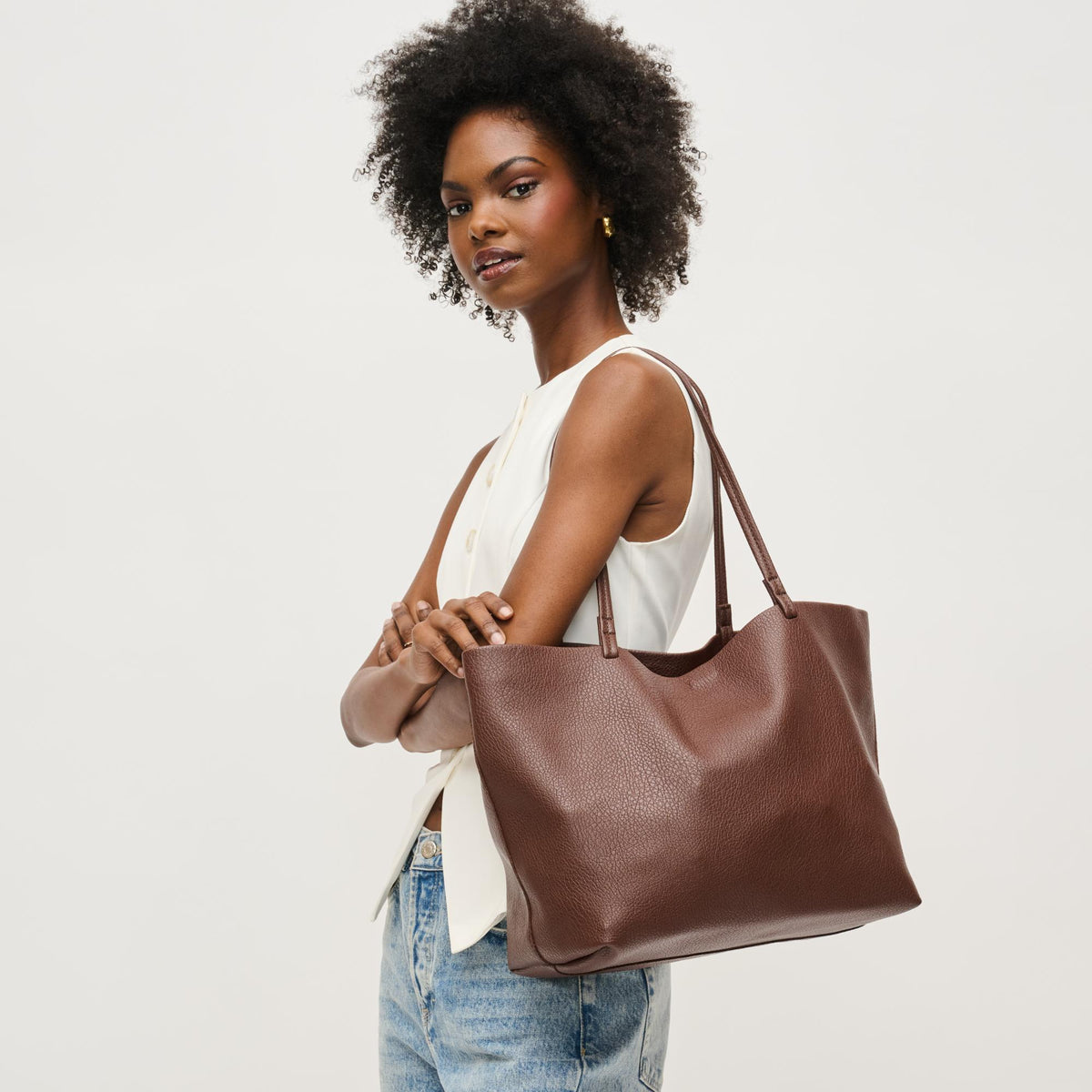 Woman wearing Chocolate Urban Expressions Alma Tote 840611146816 View 1 | Chocolate