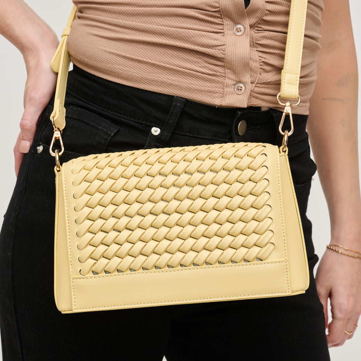 Woman wearing Butter Urban Expressions Nina Crossbody 840611144546 View 4 | Butter