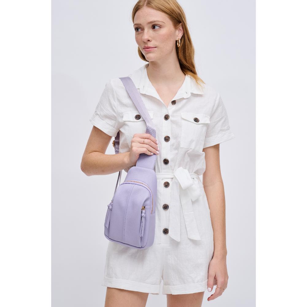 Woman wearing Lilac Urban Expressions Emille Sling Backpack 840611191588 View 2 | Lilac