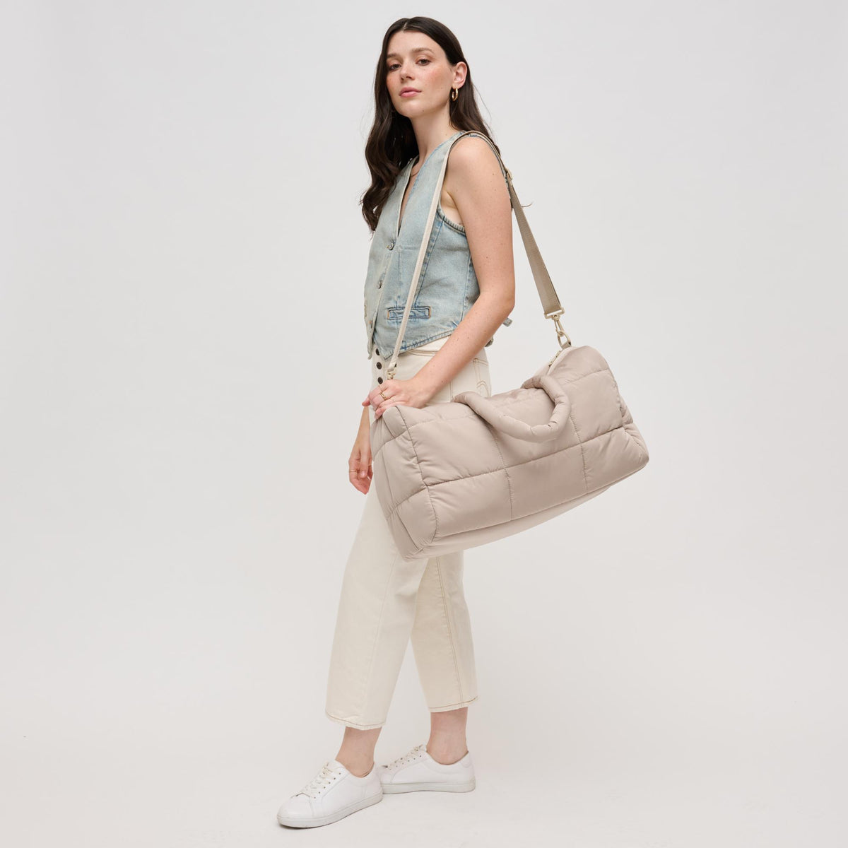 Woman wearing Natural Urban Expressions Freyja Duffel 840611124296 View 4 | Natural