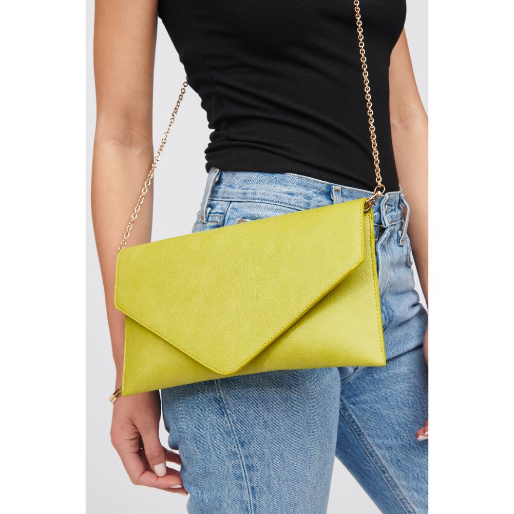 Woman wearing Citron Urban Expressions Izzy Clutch 840611100221 View 1 | Citron