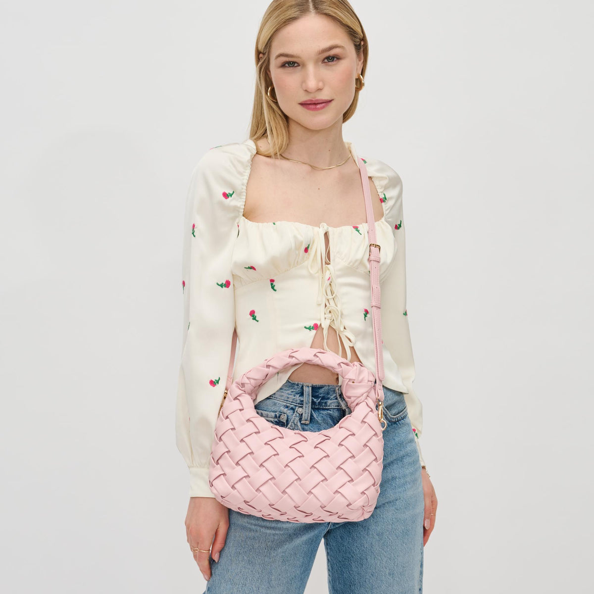 Woman wearing Rose Urban Expressions Josie Crossbody 840611126436 View 2 | Rose