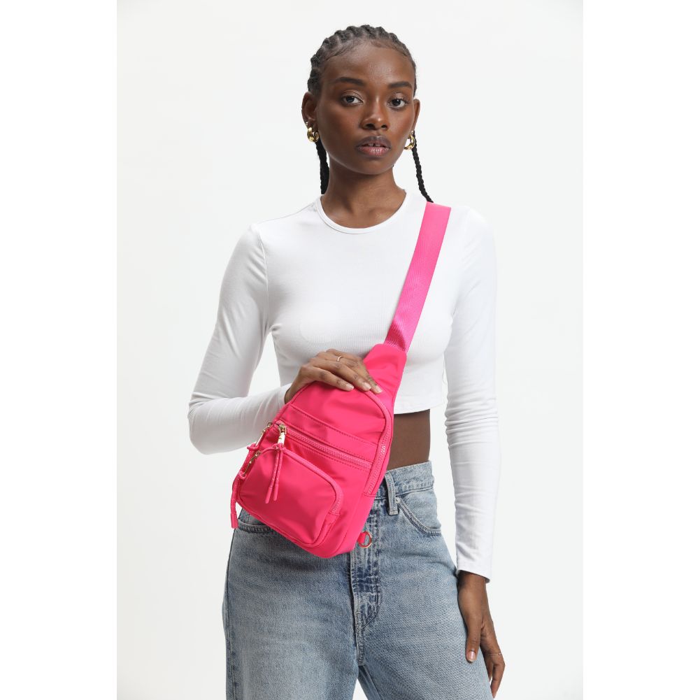 Woman wearing Rose Urban Expressions Sid Sling Backpack 840611120717 View 2 | Rose