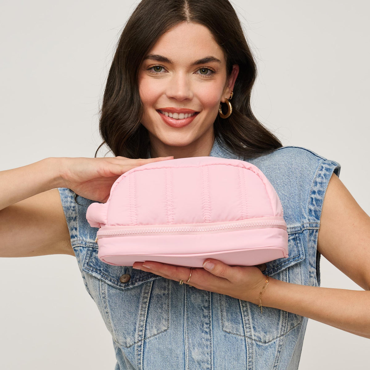 Woman wearing Light Pink Urban Expressions Jet - Nylon Dopp Kit 840611195289 View 1 | Light Pink