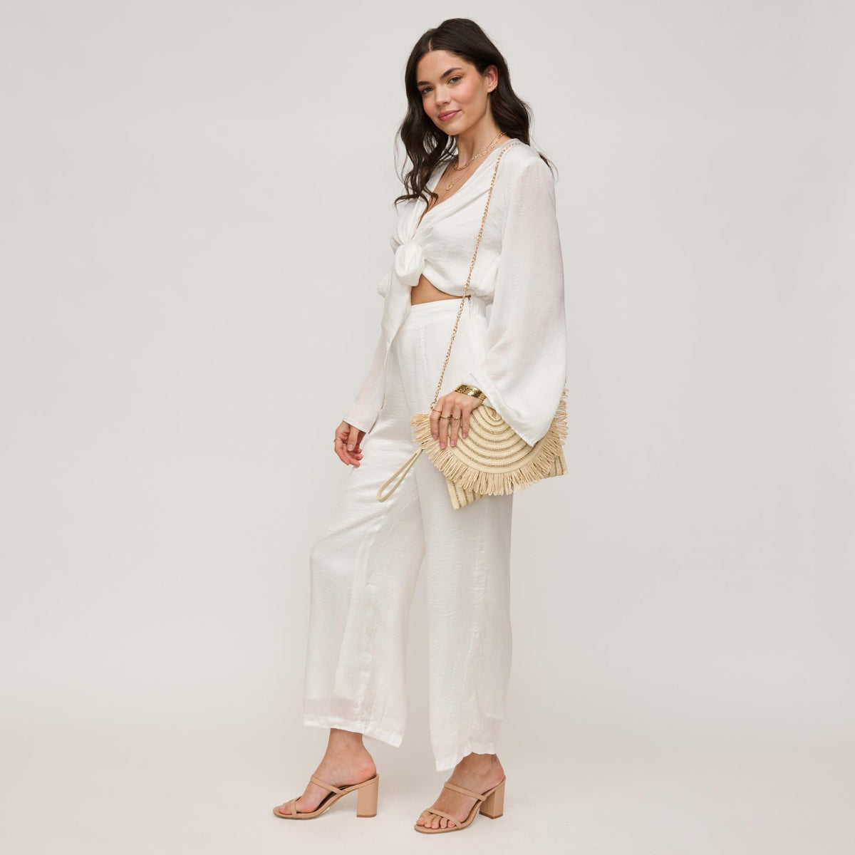 Woman wearing Ivory Gold Urban Expressions Katie Clutch 840611156914 View 4 | Ivory Gold