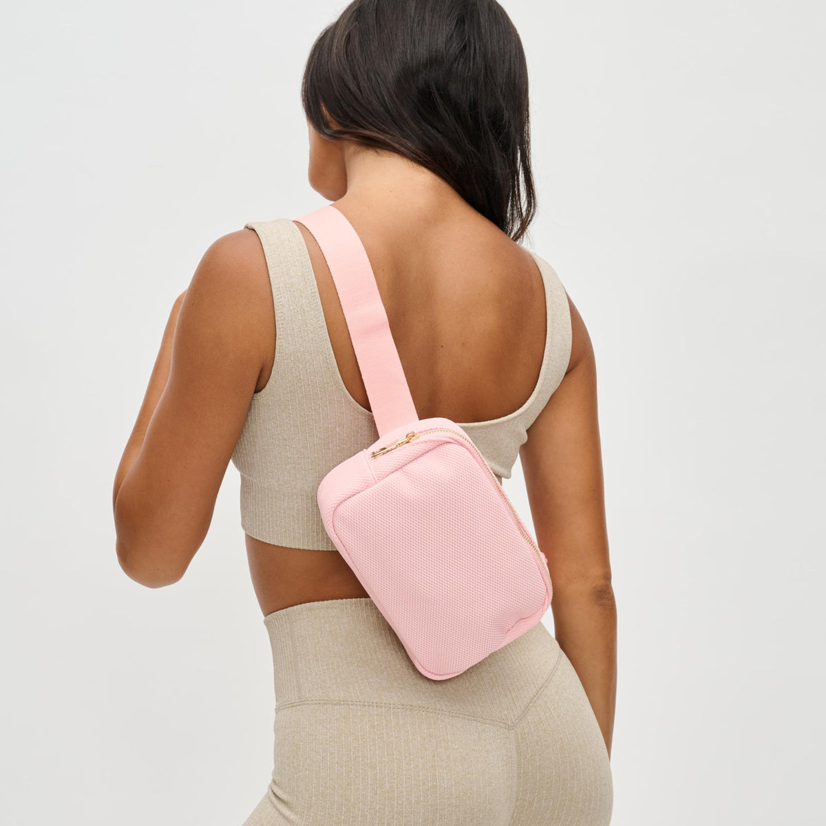 Woman wearing Blush Urban Expressions Felix Belt Bag 840611122735 View 2 | Blush