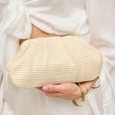 Woman wearing Ivory Urban Expressions Triana Clutch 840611156518 View 1 | Ivory