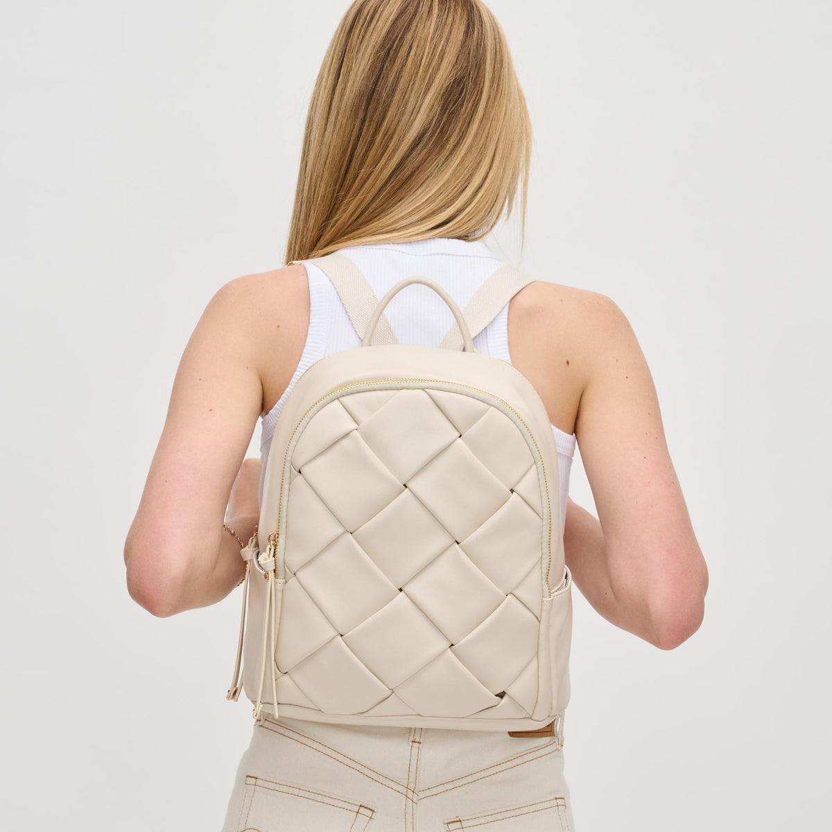 Woman wearing Oatmilk Urban Expressions Blossom Backpack 840611130648 View 1 | Oatmilk