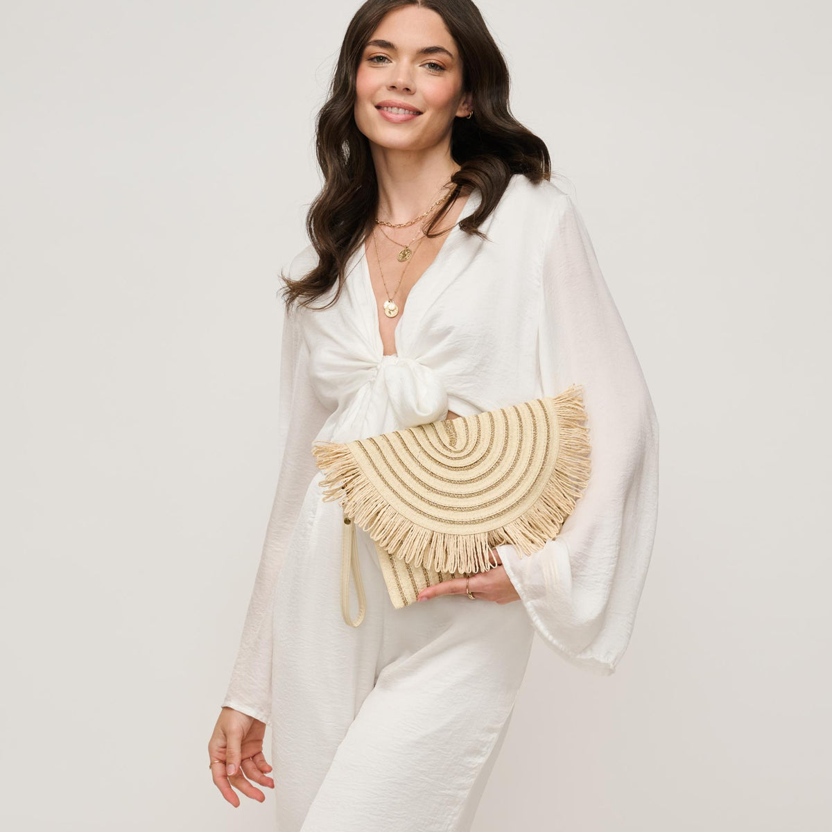 Woman wearing Ivory Gold Urban Expressions Katie Clutch 840611156914 View 2 | Ivory Gold