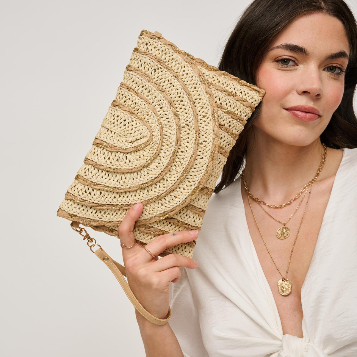 Woman wearing Ivory Natural Gold Urban Expressions Lila Clutch 840611161529 View 1 | Ivory Natural Gold