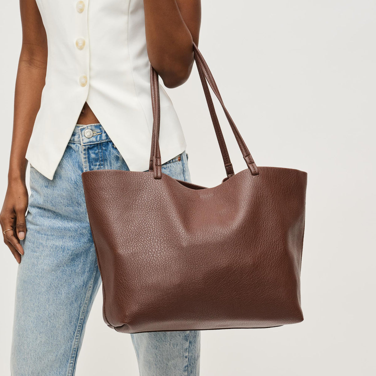 Woman wearing Chocolate Urban Expressions Alma Tote 840611146816 View 4 | Chocolate